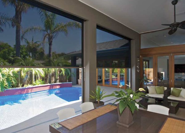 Zipscreen on Torquay home overlooking pool and palm trees.