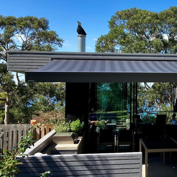 Folding arm awnings extending from side of Geelong home.