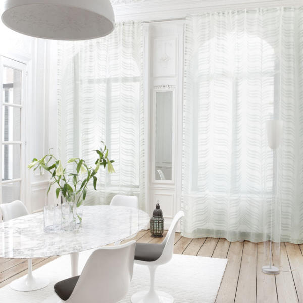 Dining room with sheer blinds covering large windows in Geelong.