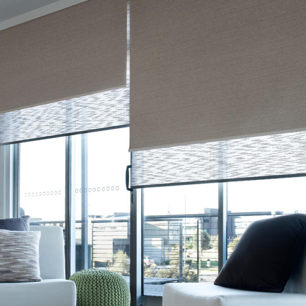 View over Geelong through window with sheer roller blinds.