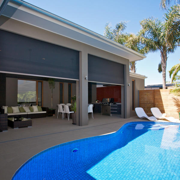 Zipscreen outdoor blinds at a home.