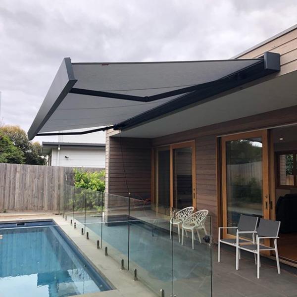 Large folding arm awnings giving shade to Torquay home.