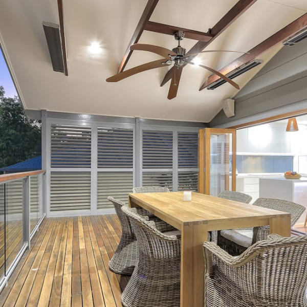 Covered outdoor entertaining area in Geelong with aluminum shutters.